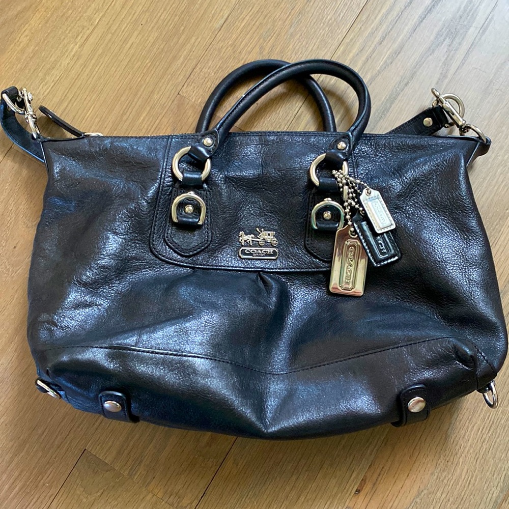 Black leather coach bag with removable top shoulder strap.
